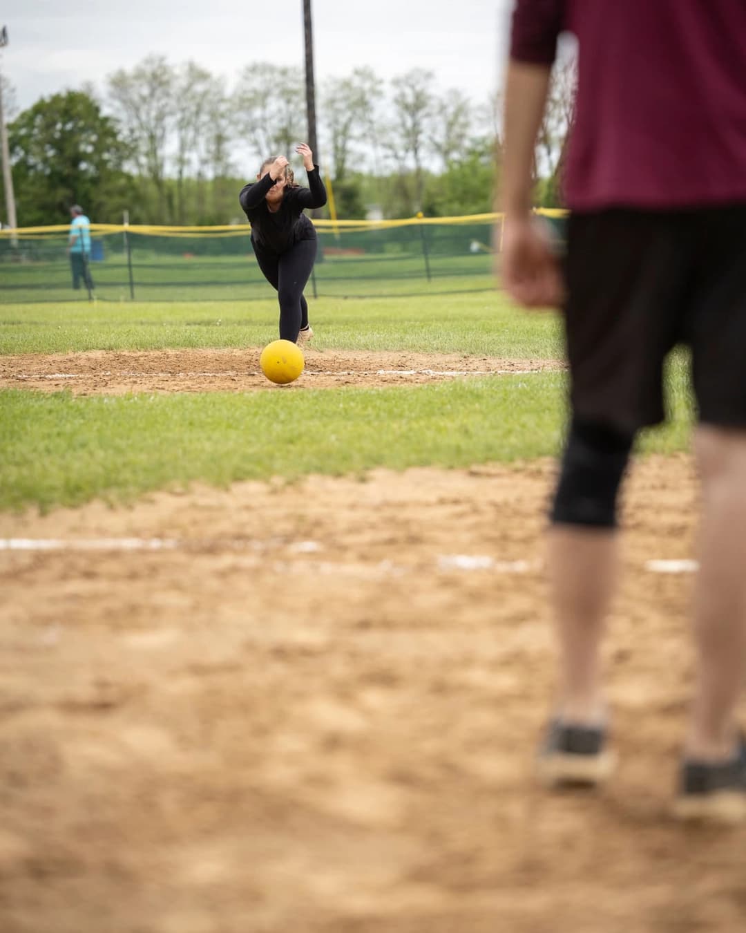 Kickball players in action