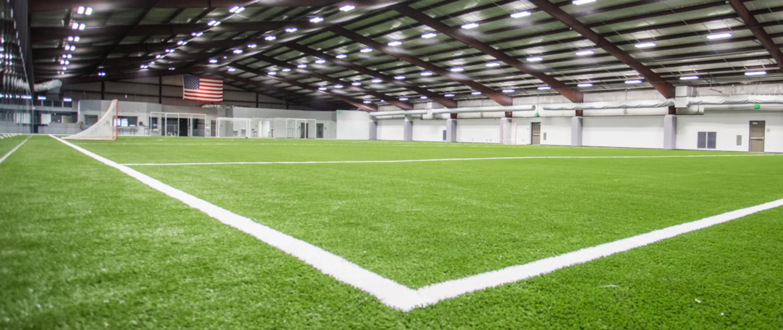 Indoor soccer players in action