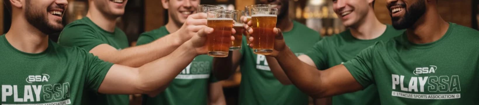Friends in green PlaySSA shirts raising a toast together